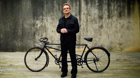 Bono te convida para dar uma volta de bike